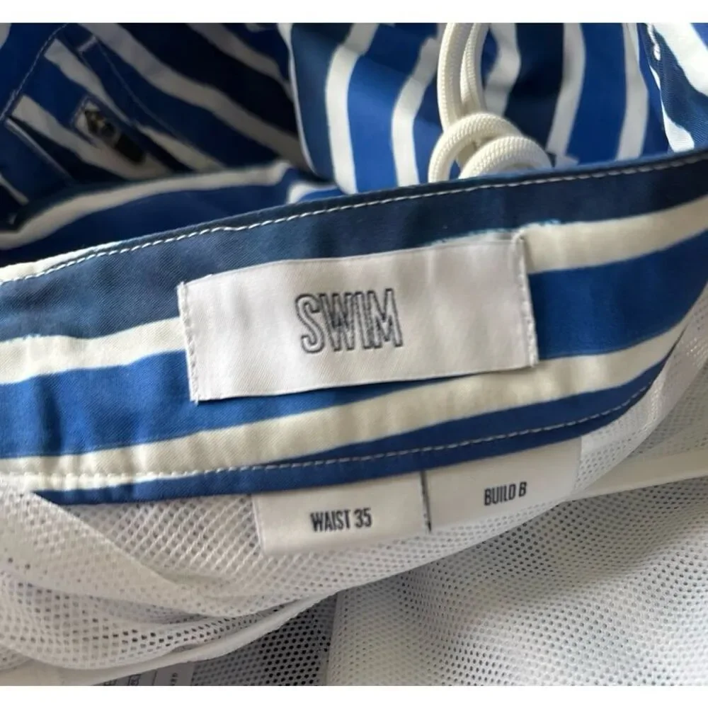 Spoke swim trunks